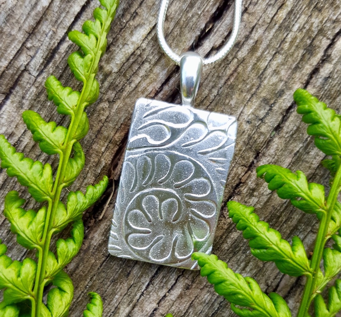 Rectangular Pendant with silver fer design