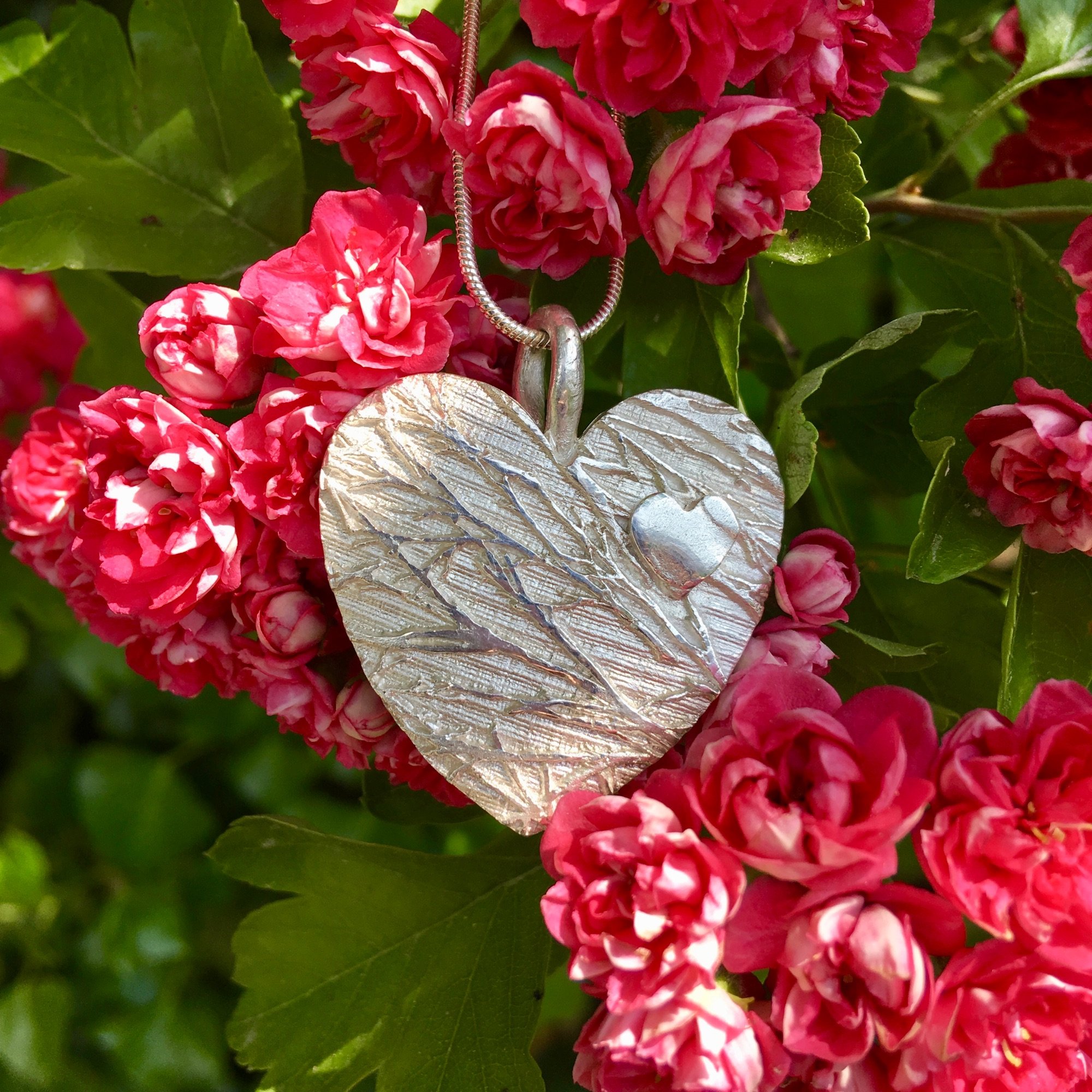 Heart shaped silver birch pendant