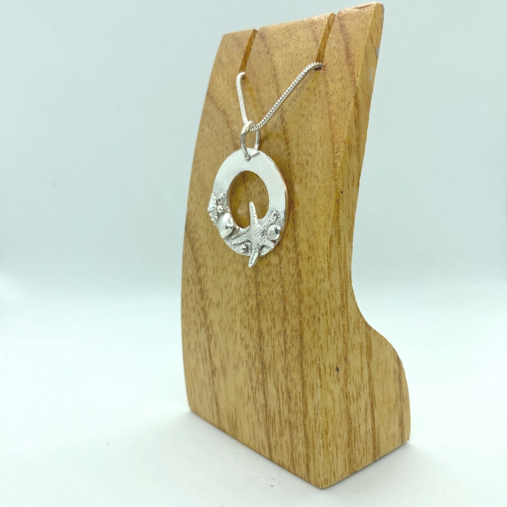 Solid silver Rockpool inspired pendant