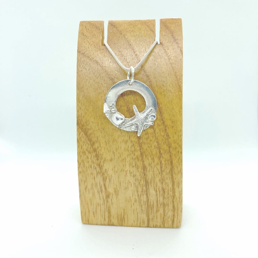 Solid silver Rockpool inspired pendant