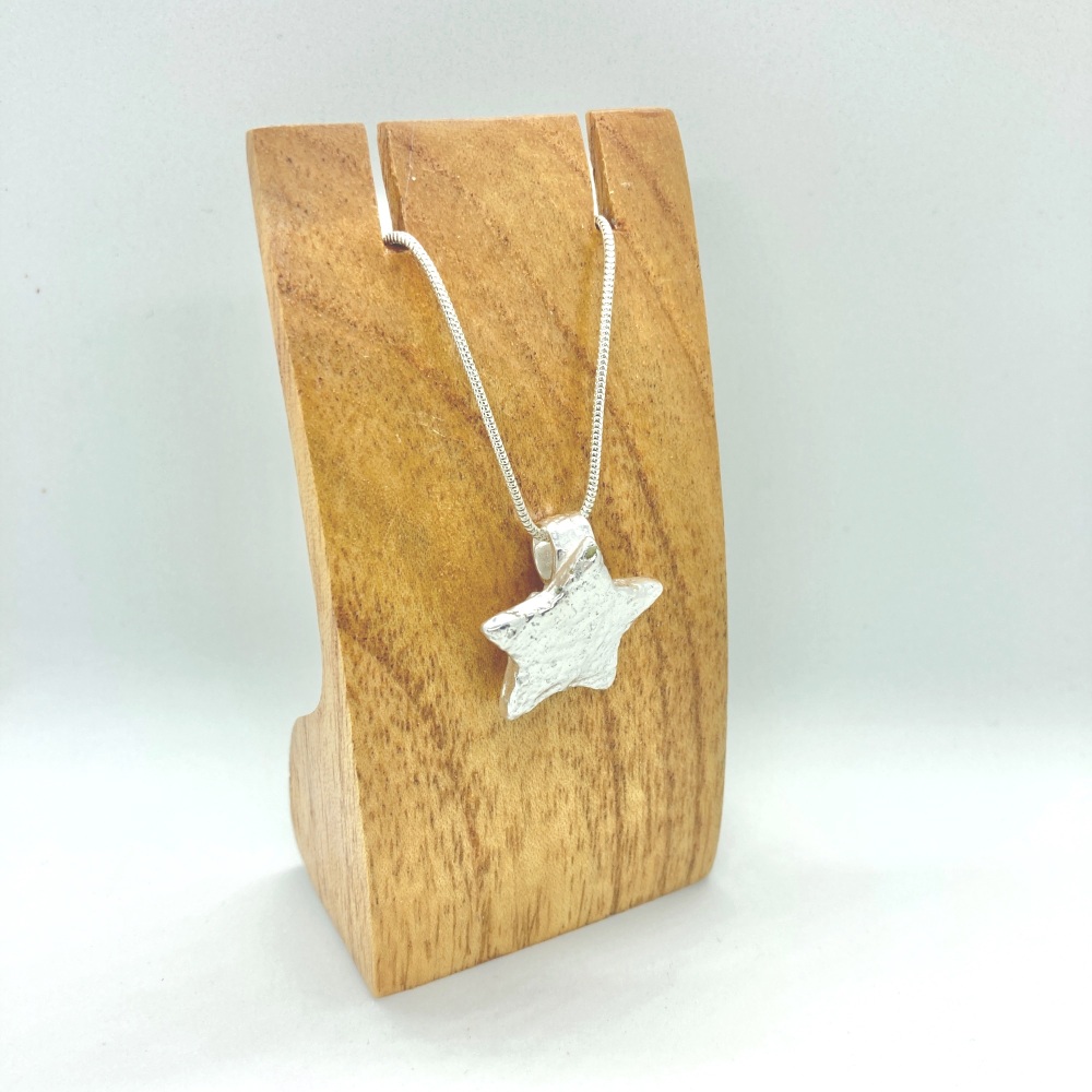 Solid silver handmade star pendant on silver snake chain