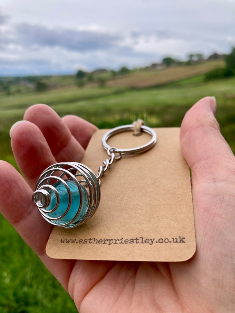 TURQUOISE BLUE vintage glass marble in silver cage on a key chain