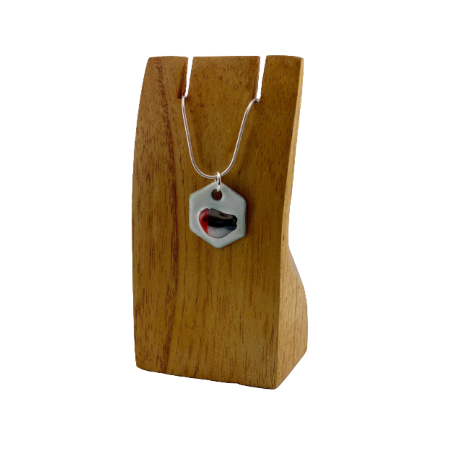 Robin Pendant - small white enamel hexagon with a fused glass robin