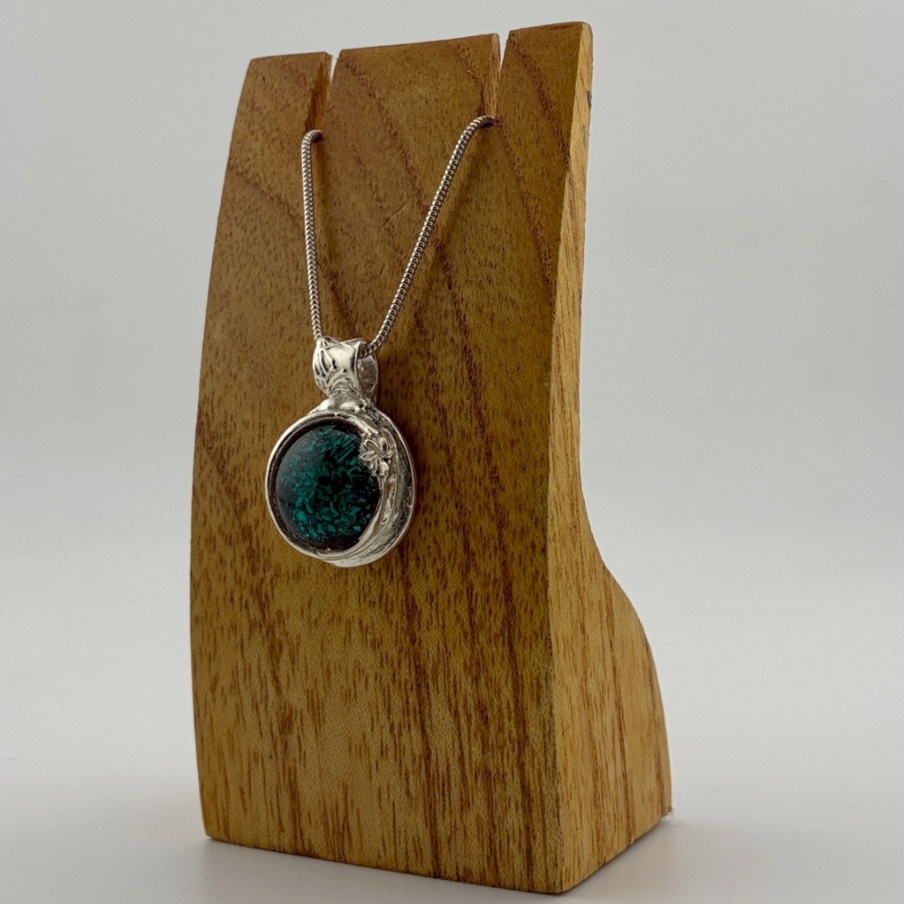 Peacock green glass cabochon set in a silver pendant - unique design
