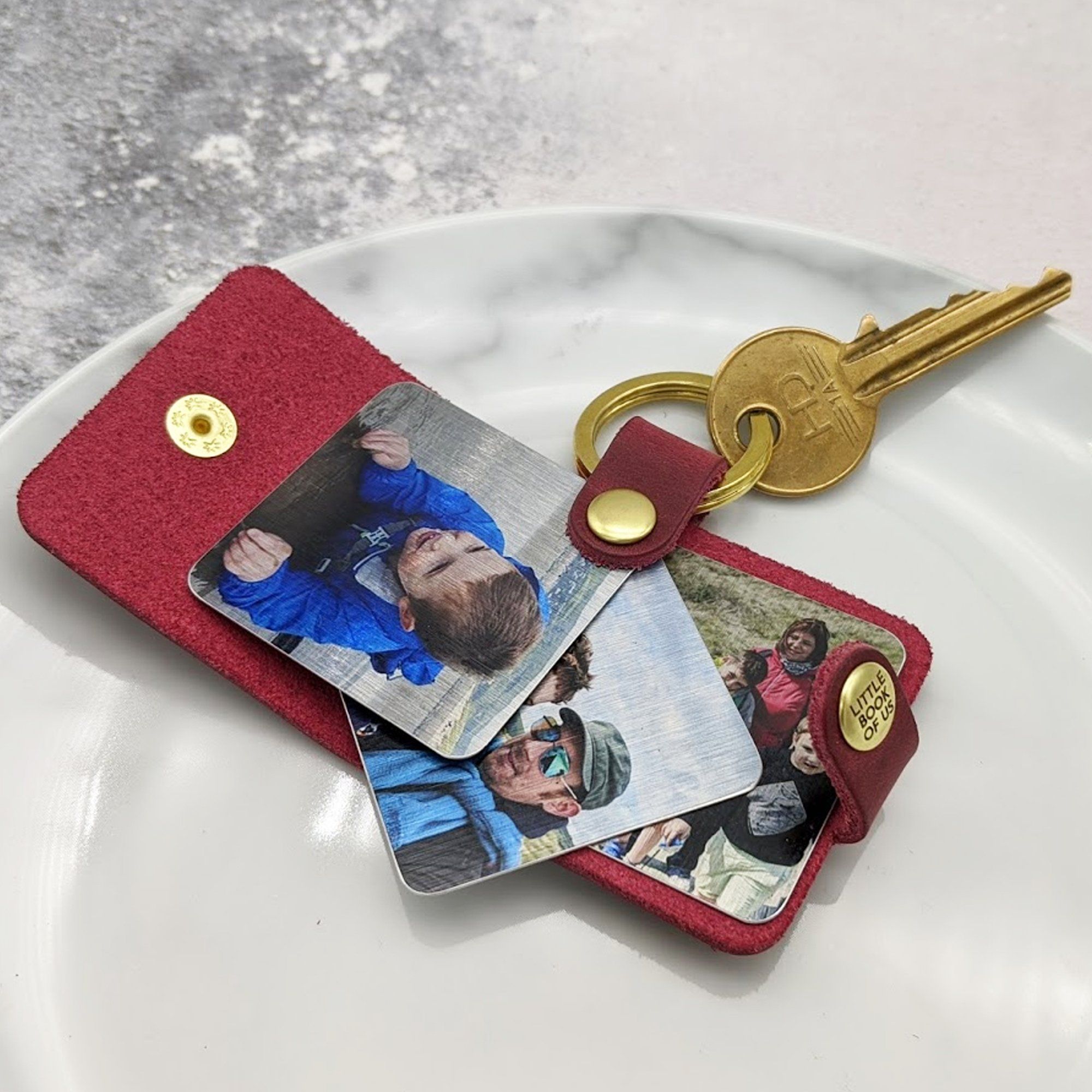 Photo book keyring containing three pictures