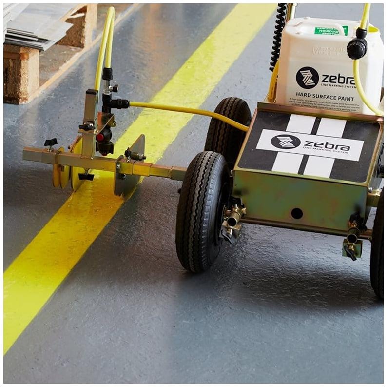 Factory floor safety line repainting with Manor Floor Care