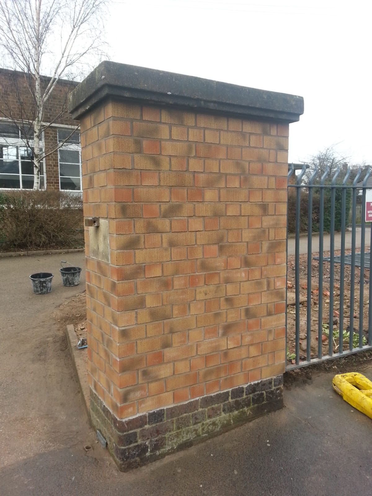 Rebuilt brick pillar