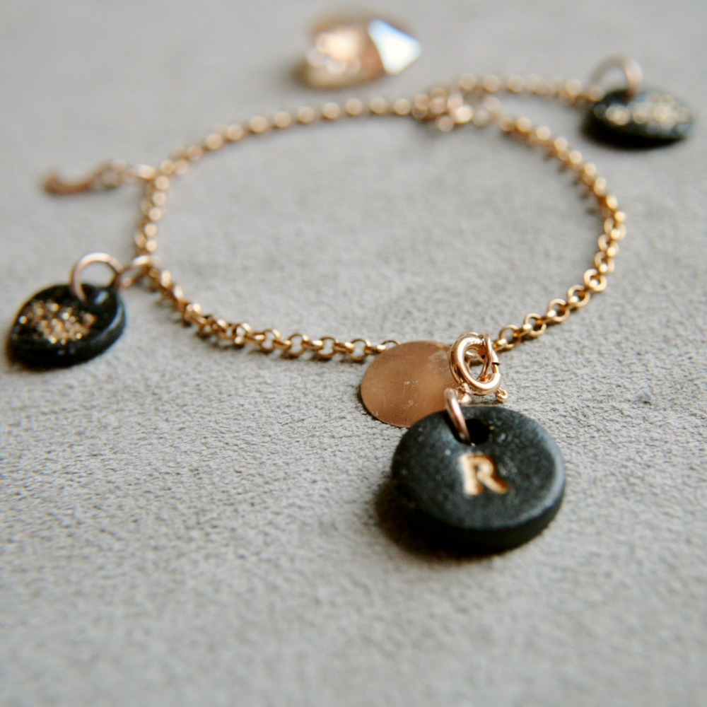 Gold bracelet with charms and moon