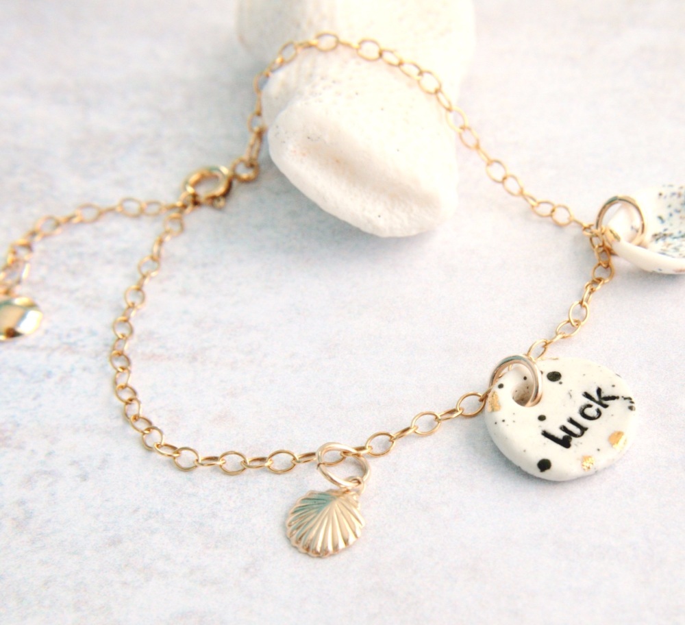 Wellbeing bracelet with handmade porcelain charms