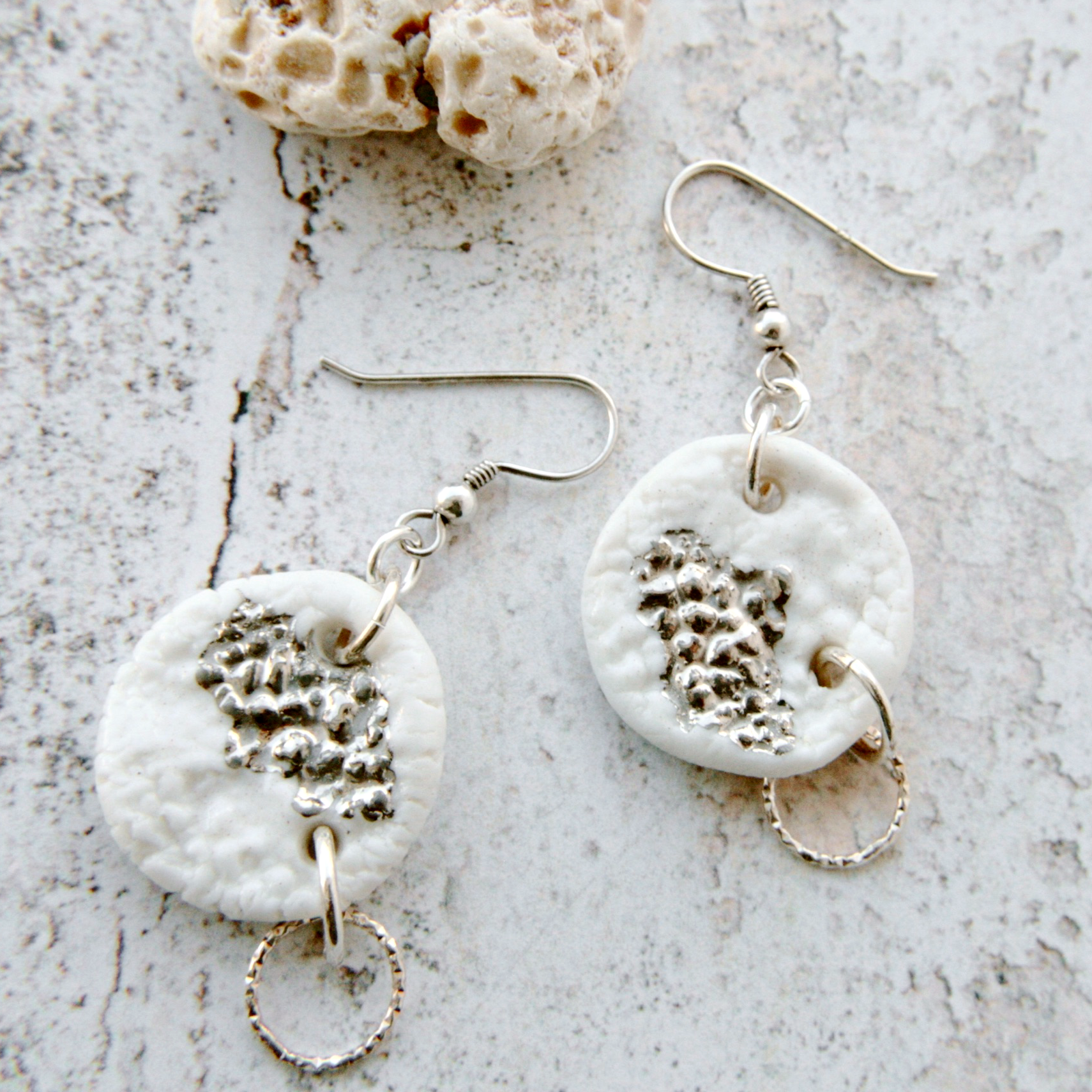 white organic earringsfrom porcelain