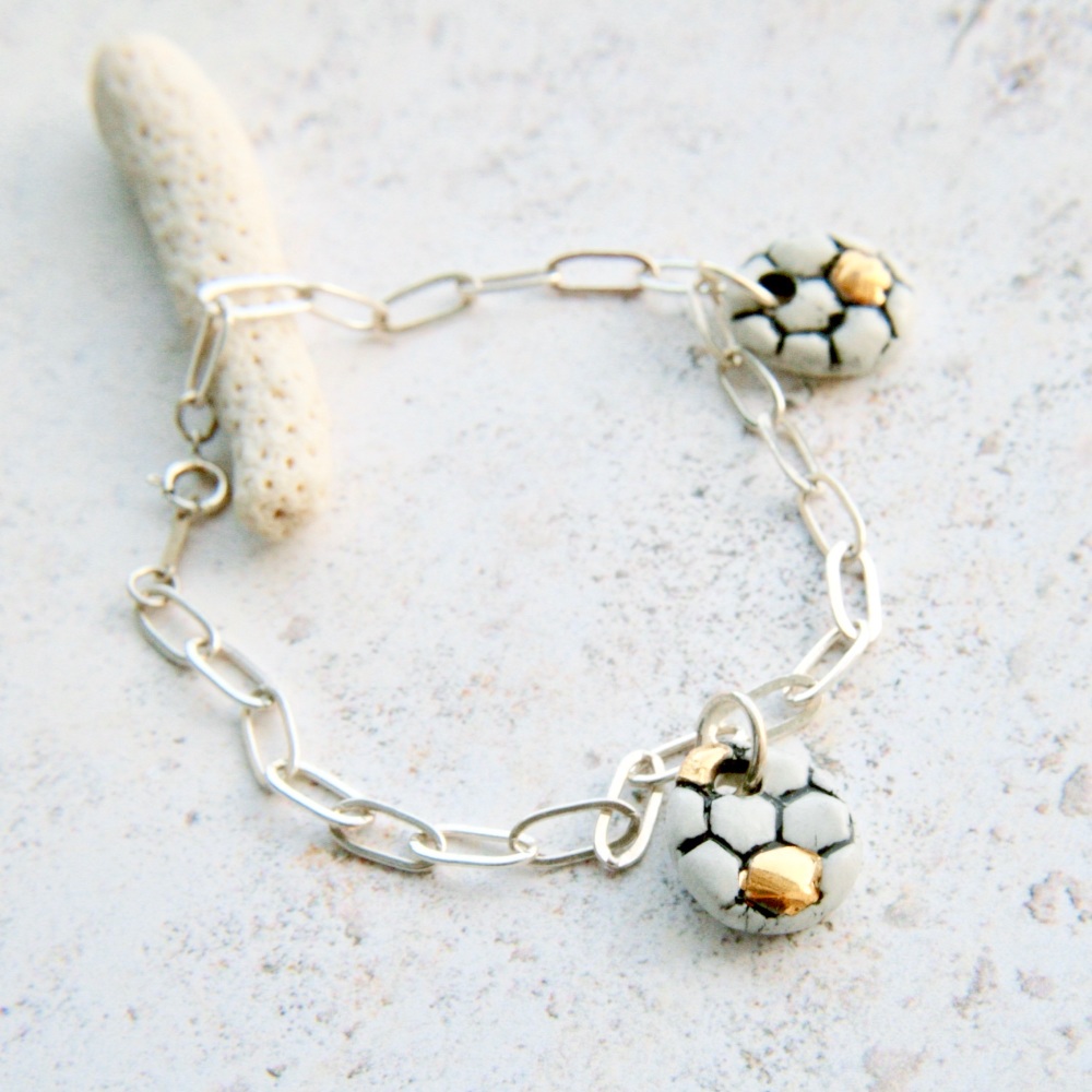 Sterling silver bracelet with honeycomb charms on cable chain 