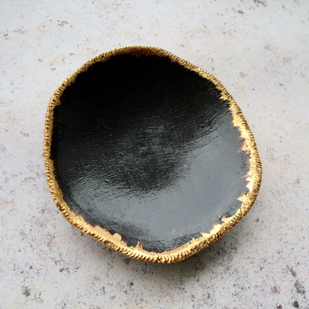 Black porcelain trinket dish with gold rims, for your jewellery or candles.