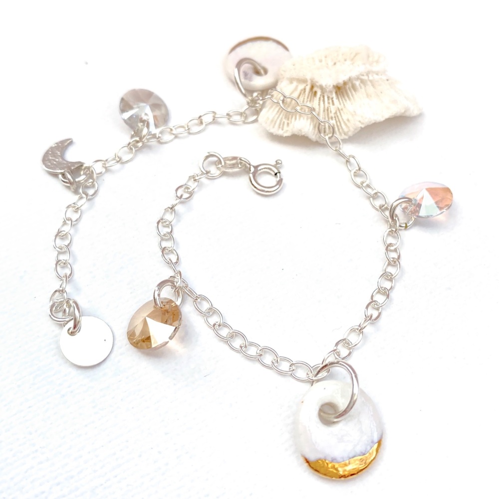 Sterling silver bracelet with porcelain charms.