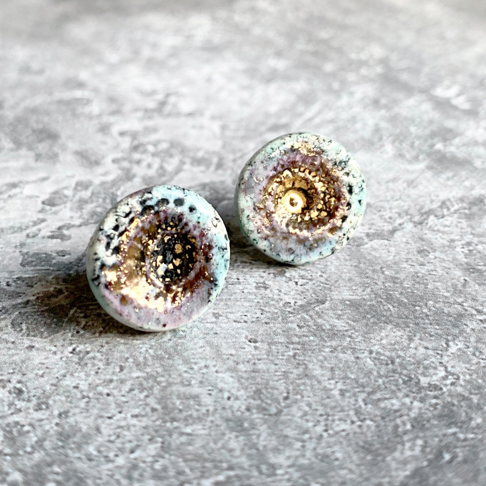 Porcelain stud earrings. Spiral imprint.