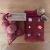 NutCrackers - Assorted Christmas Walnut shell surprise crackers in a burgundy organza bag - contents.jpg