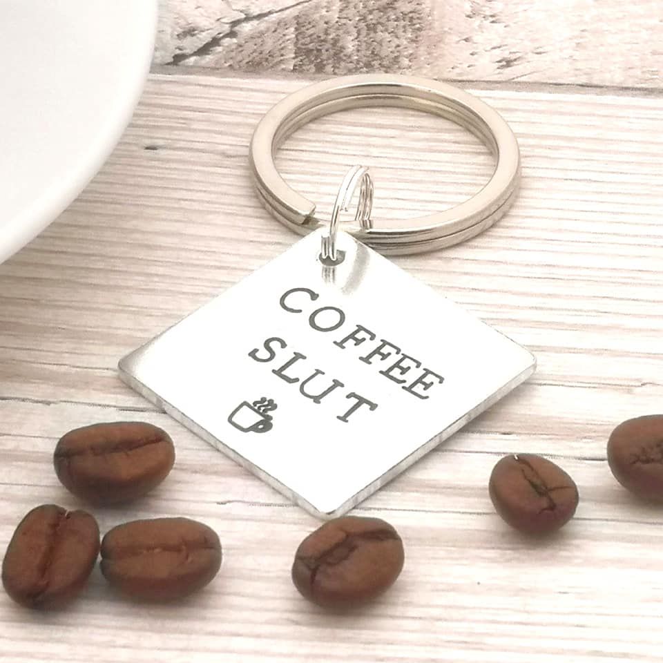Square metal keyring with wording coffee slut & small coffee cup stamp