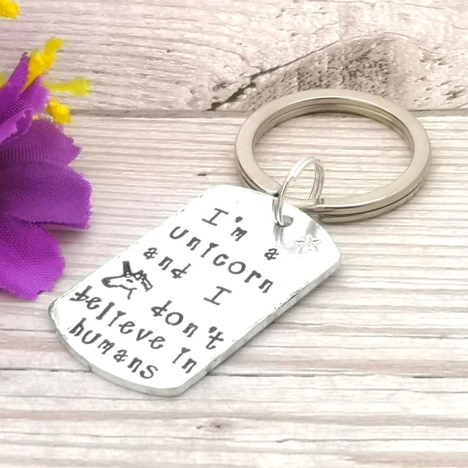 I'm a unicorn and I don't believe in humans. Metal keyring