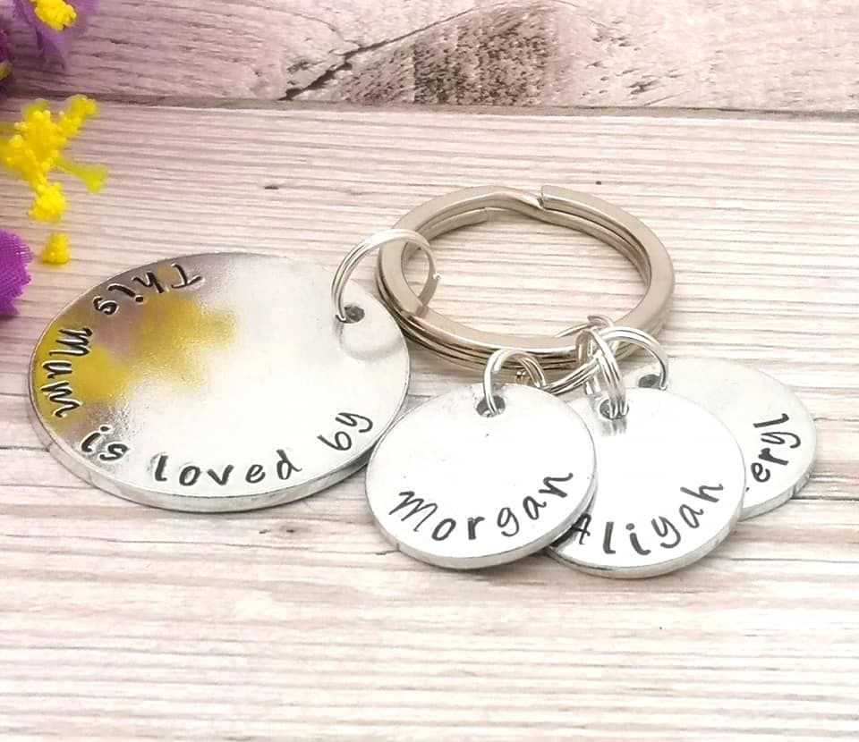 This Mum is loved by keyring. Multiple personalised name charms