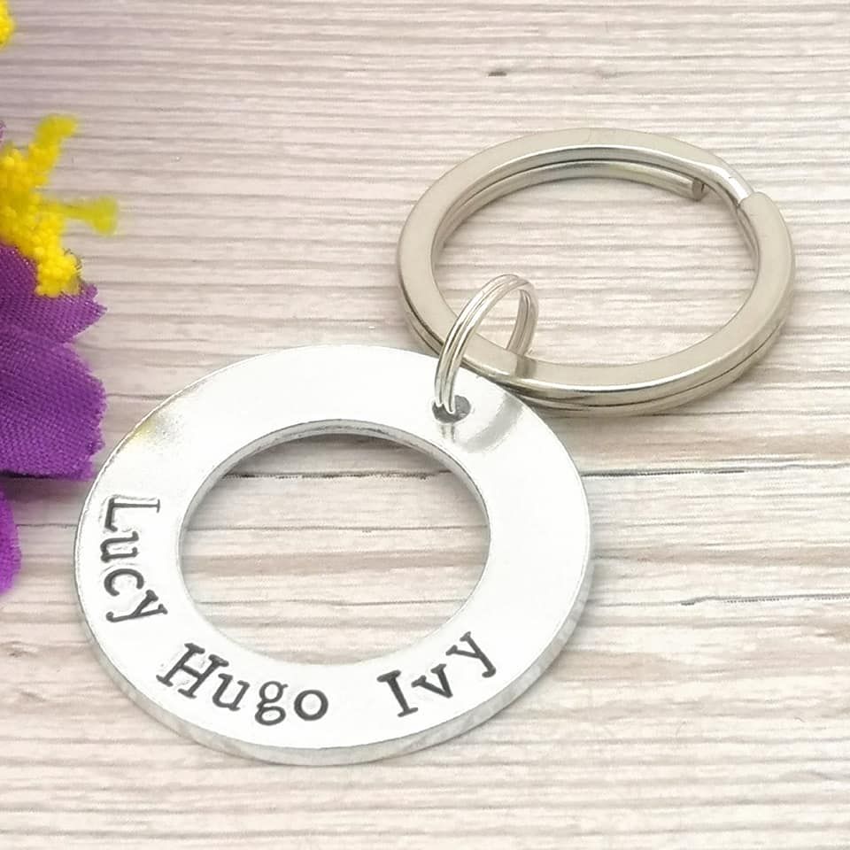 Circular washer style keyring personalised with names
