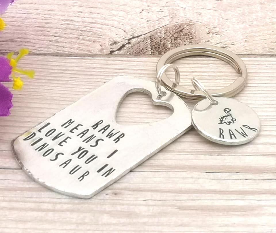 Rawr means I love you in dinosaur. Metal keyring with dinosaur charm