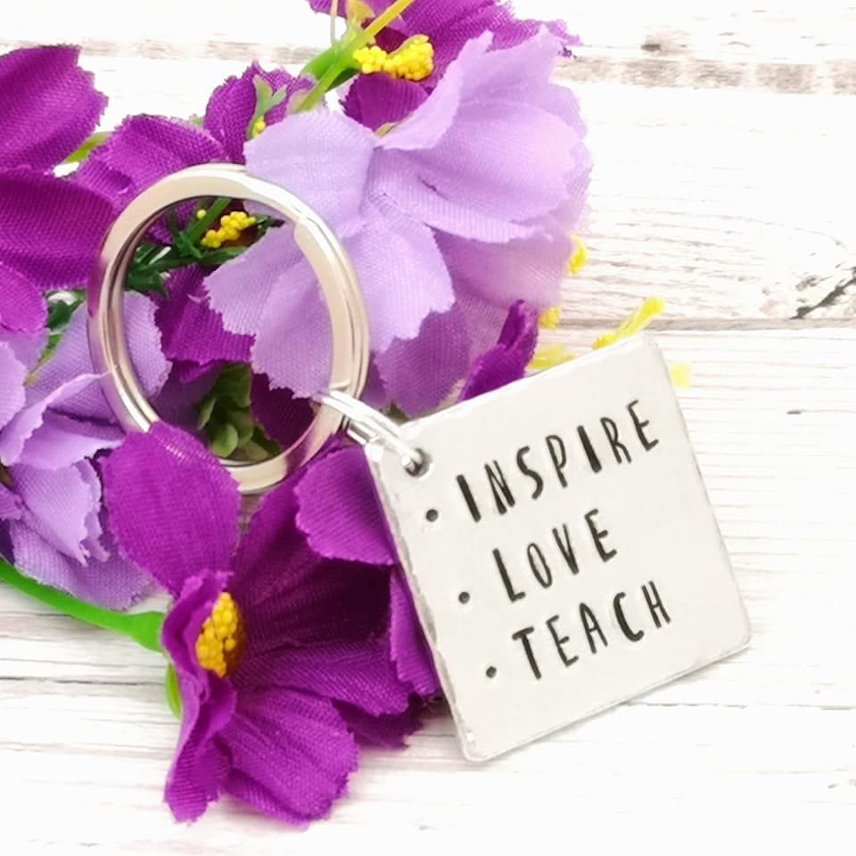 Square metal keyring with wording • Inspire • Love • Teach
