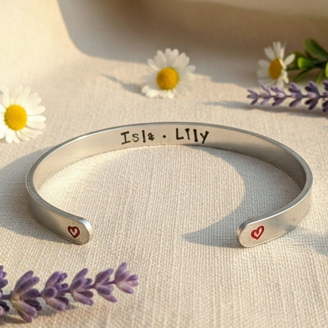 Personalised name cuff bracelet hand stamped on aluminium with heart ends