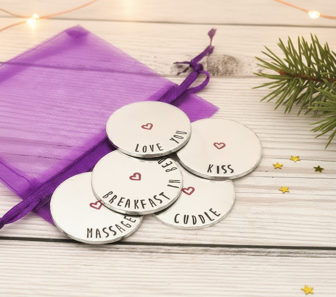 Personalised aluminium love tokens hand-stamped with custom words, small handmade keepsake gift.