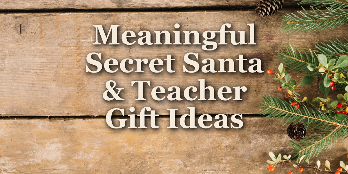Meaningful Secret Santa and teacher gift ideas text on a rustic wooden background with pine branches and pine cones