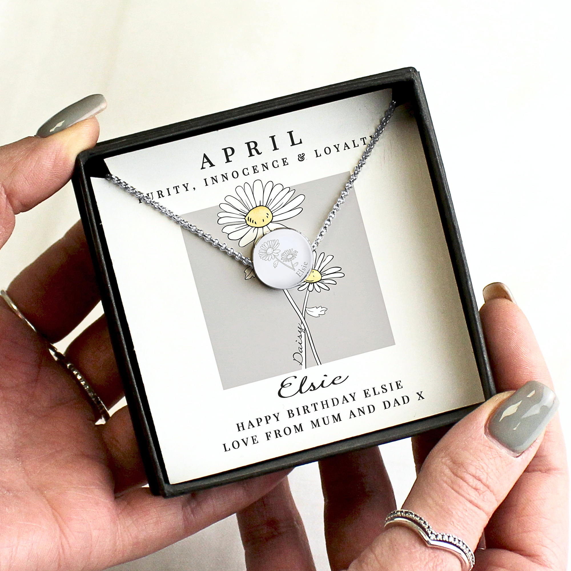 Personalised April birth flower necklace with daisy pendant and custom name in gift box