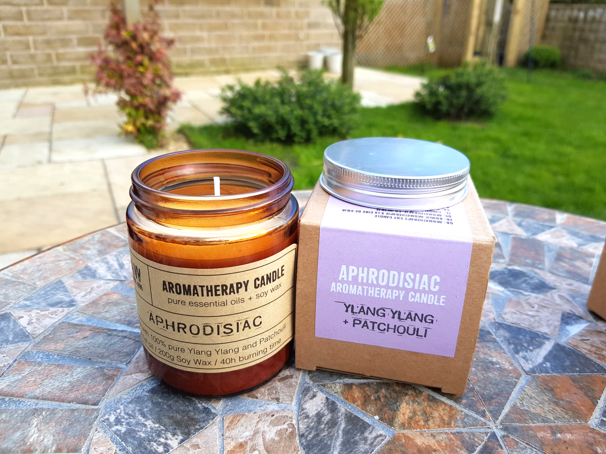 Aphrodisiac Jar vegan candle on a table