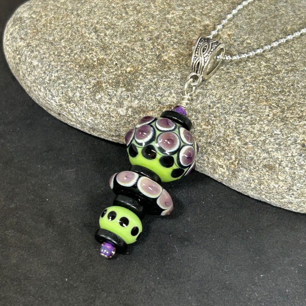 Totem lampwork pendant