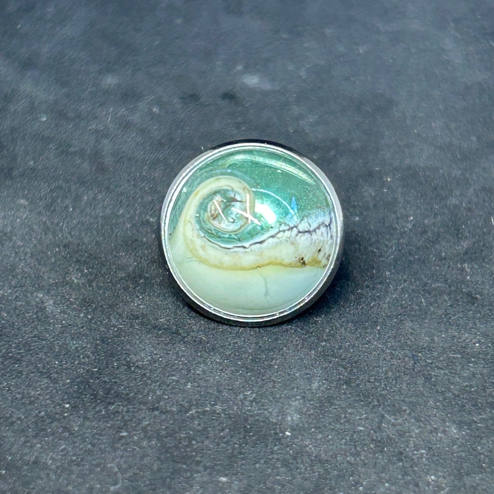 Green wave lapel pin