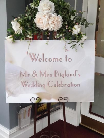 Personalised Wedding  Welcome Board on easel with flower swag decoration