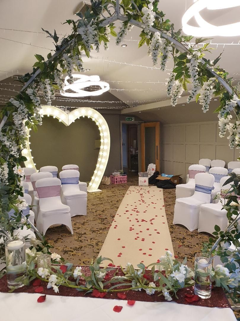 Wedding Aisle Ceremony at The Red Hall with Floral Arch, light up heart arc
