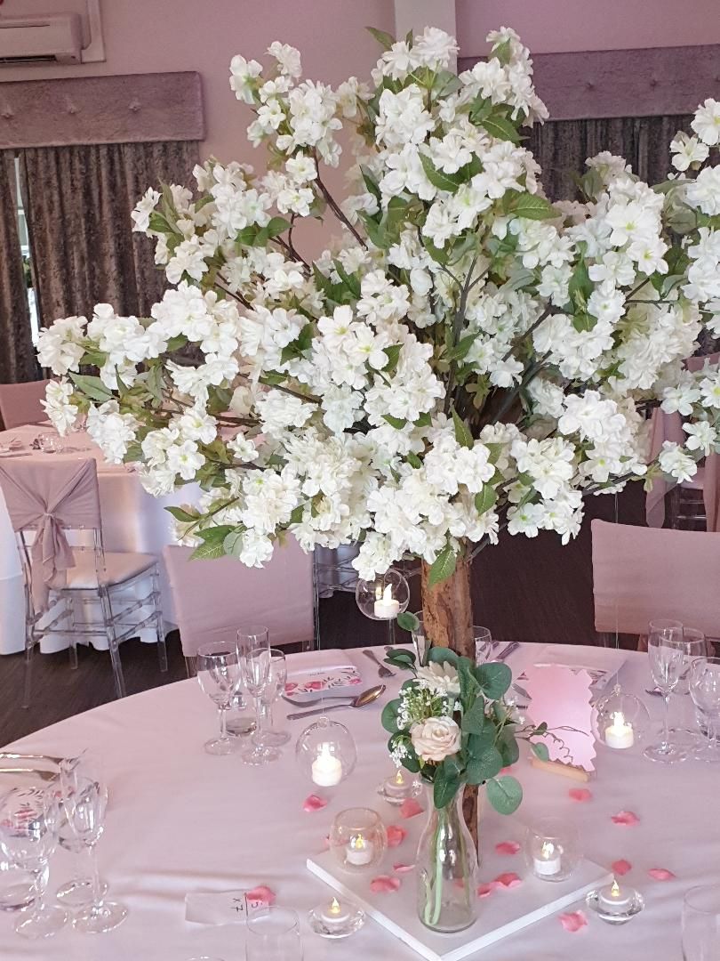 Blossom Tree Wedding Centrepiece with hanging globes and tealights with vase of flowers and tealights at the base.jpg