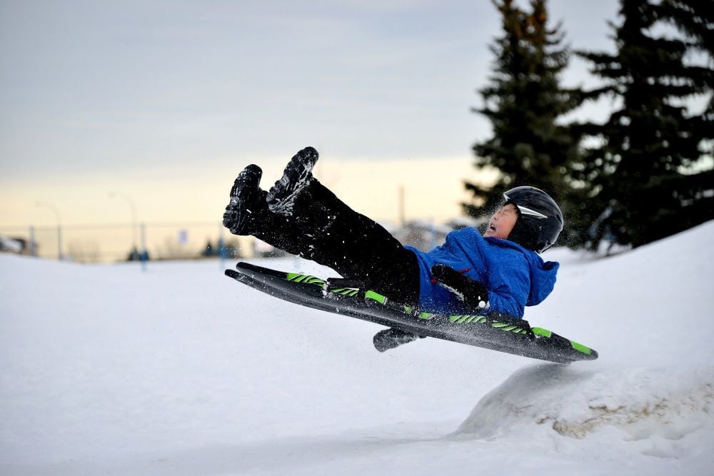 boy on sledge C S