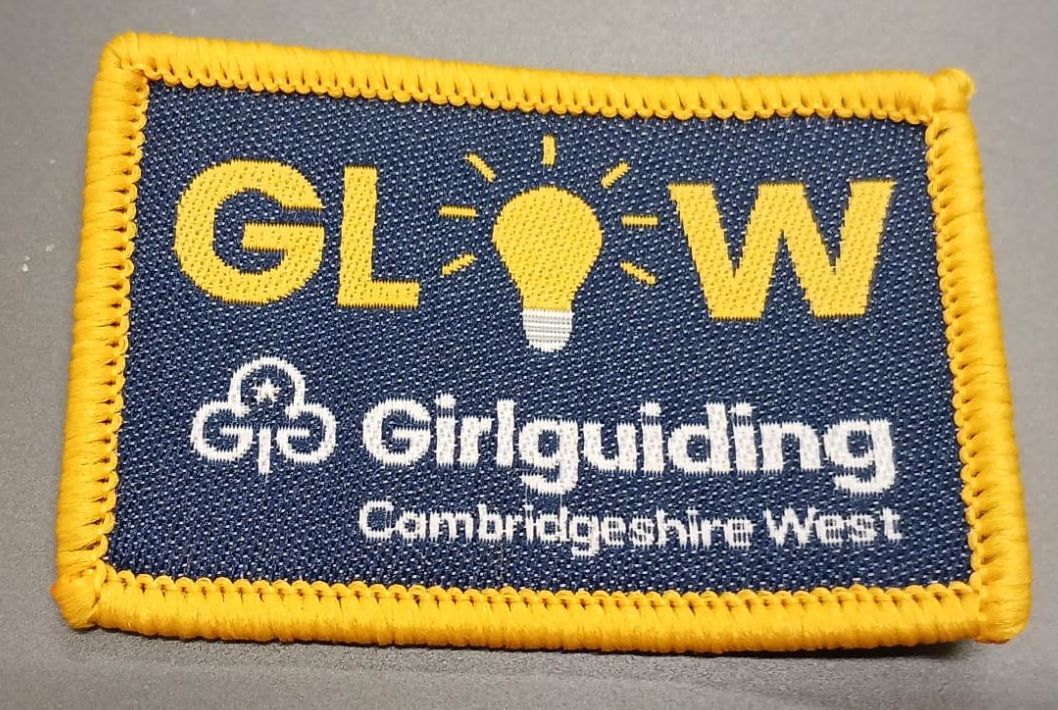 GLOW woven badge