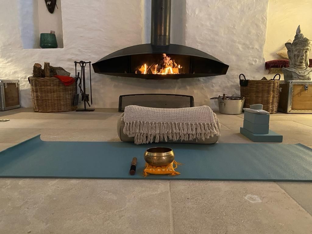Yoga mat in front of fire