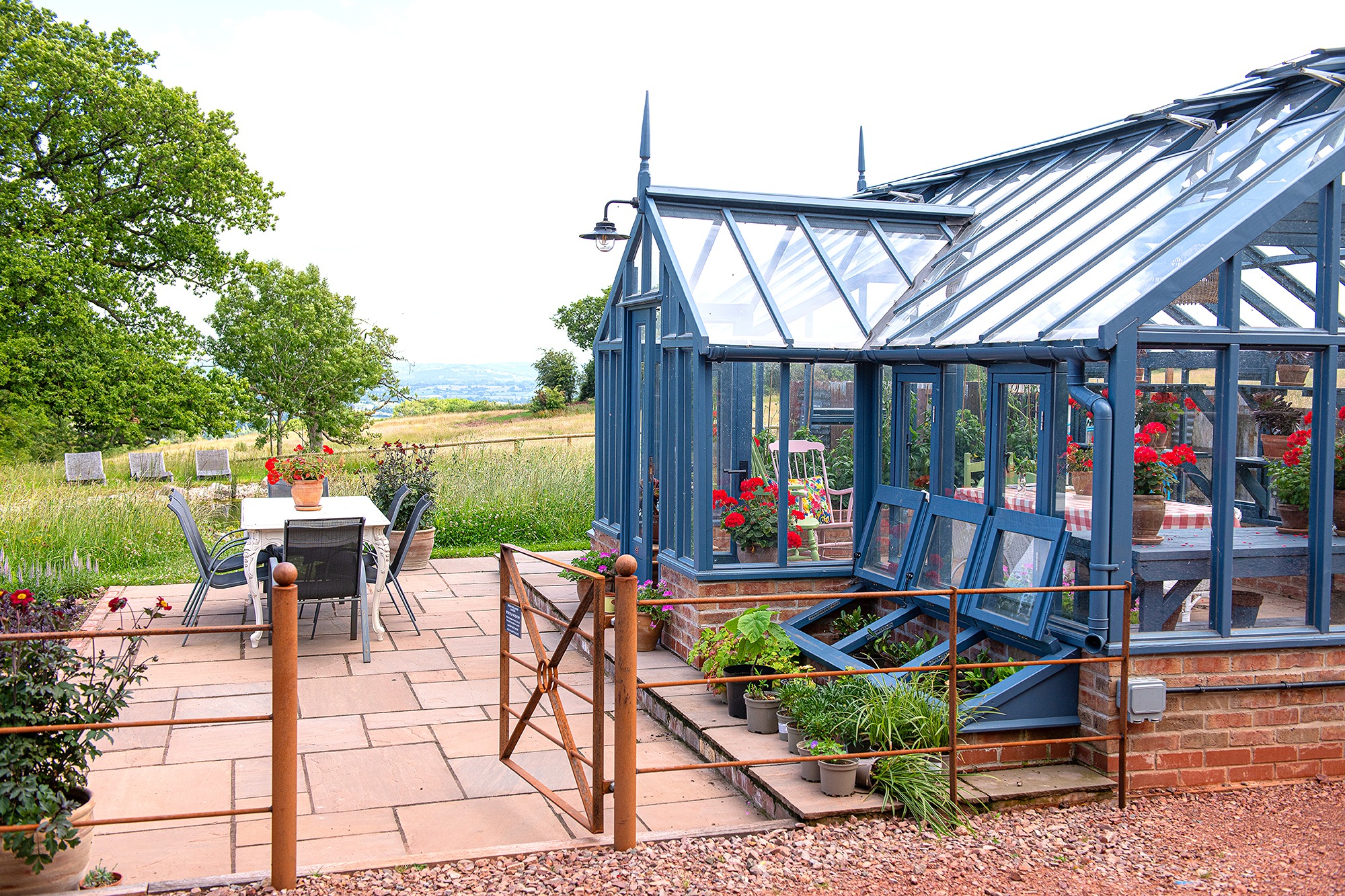Greenhouse and outdoor table.jpg