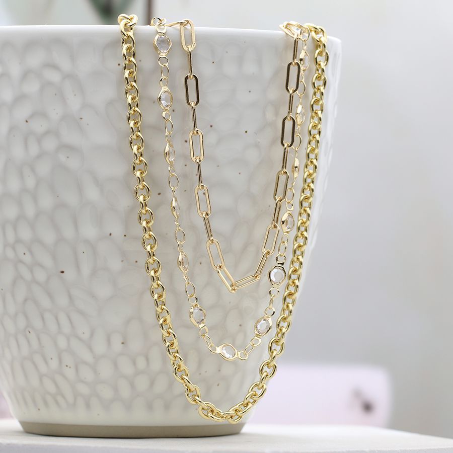 Triple layer golden chains and bezel crystals necklace