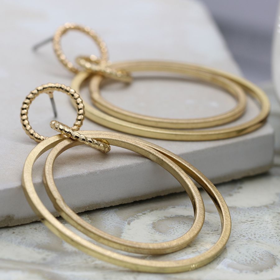 Golden multi hoop stud and drop earrings with rope twist