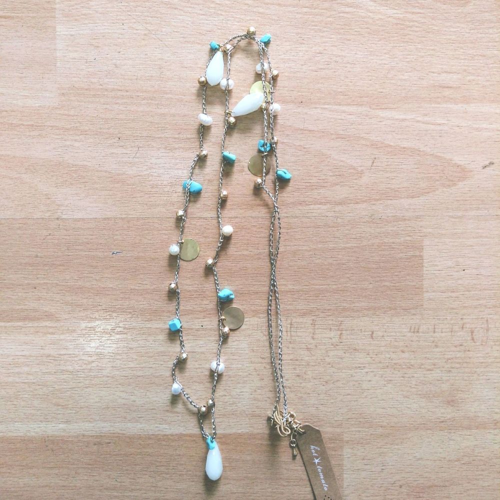 Bohemian-style gold necklace with blue and white stones (long)