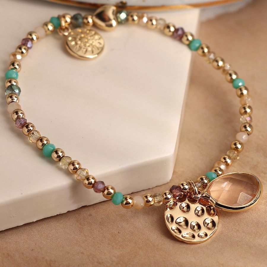 Golden and aqua mix bead bracelet with disc and crystal