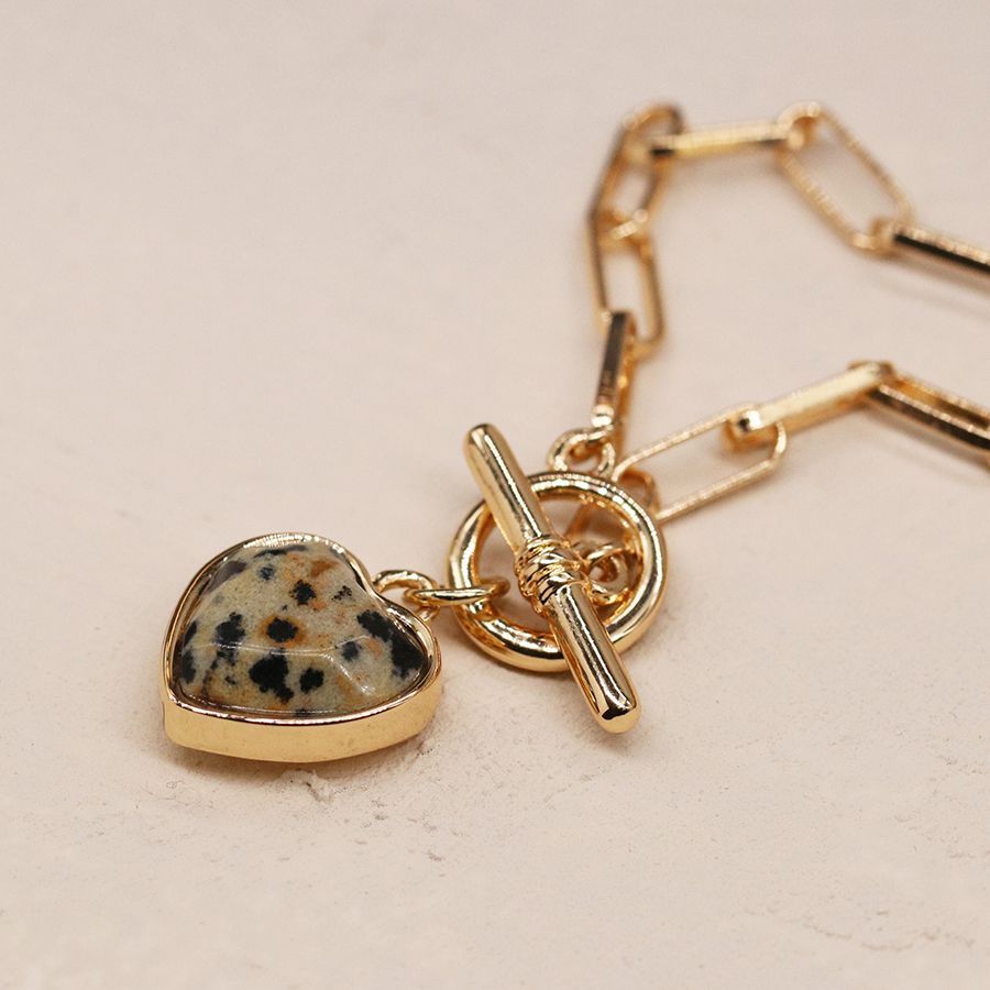 Golden dalmation heart necklace with t-bar