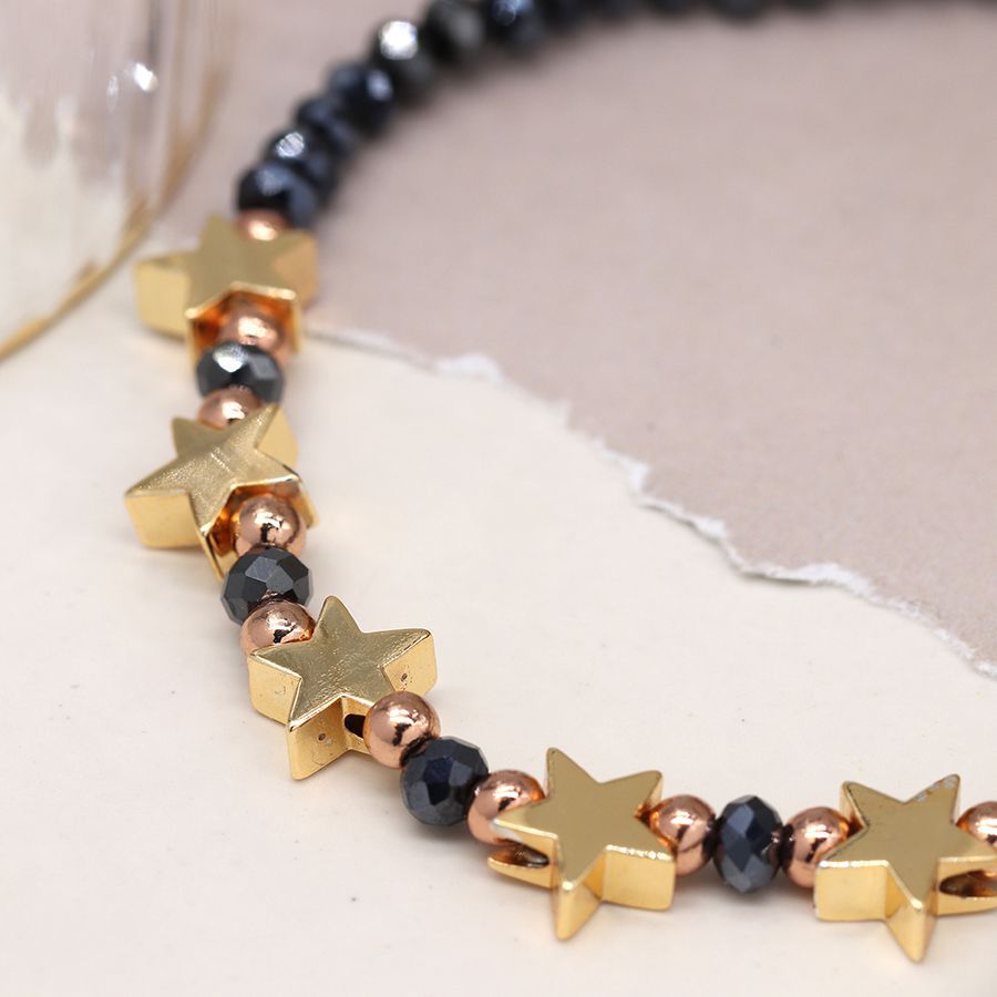 Midnight bead bracelet with golden stars and metallic beads
