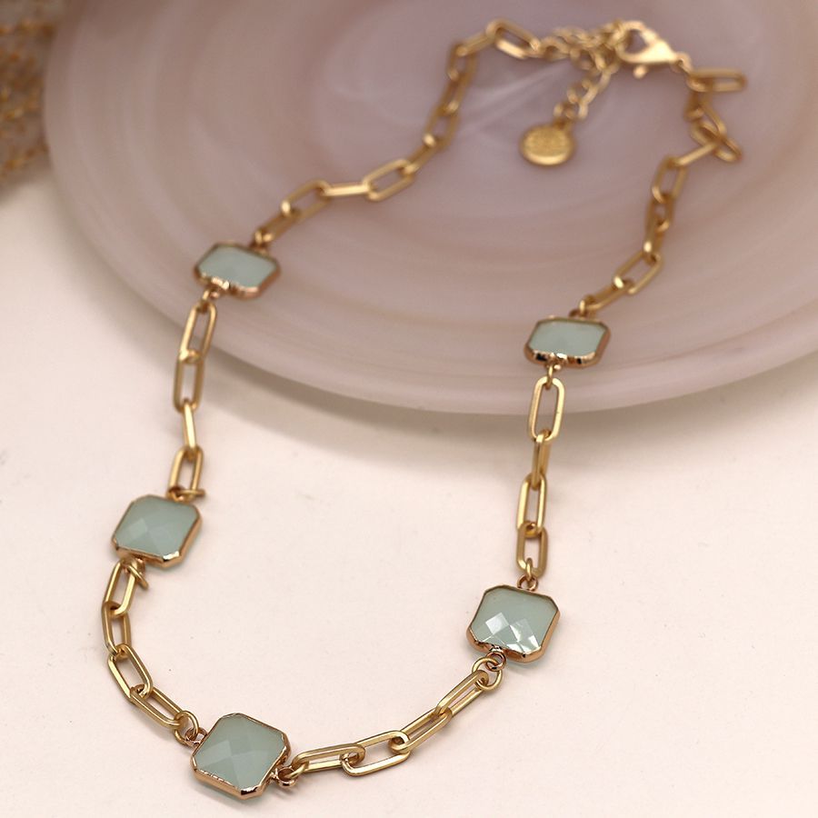 Golden necklace with aqua square stones