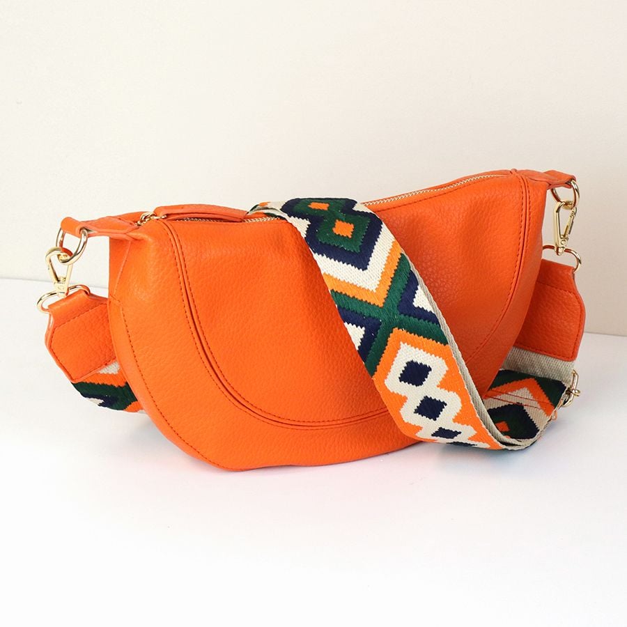 Orange vegan leather half moon bag with diamond strap