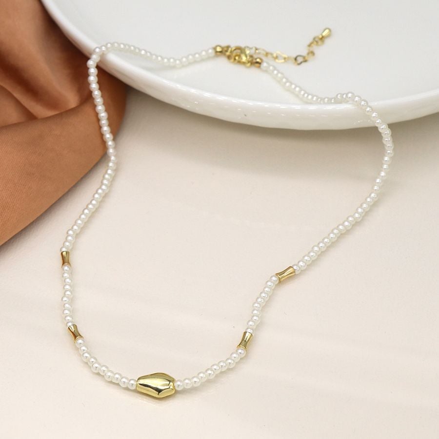 Ivory seed pearl and gold bead necklace