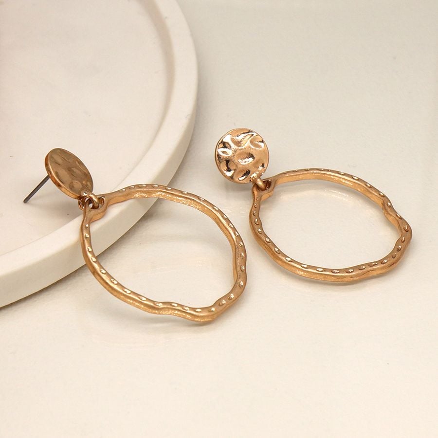 Golden hammered disc and hoop earrings