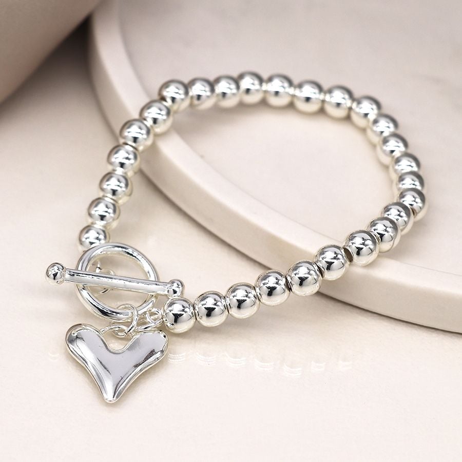 Silver plated bead and heart charm t-bar bracelet